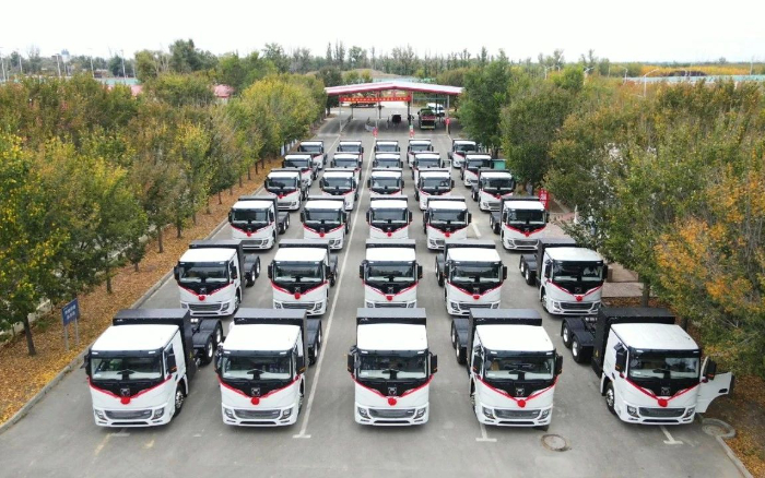 脱碳“换”绿进行时！cq9电子新能源重卡批量交付西北